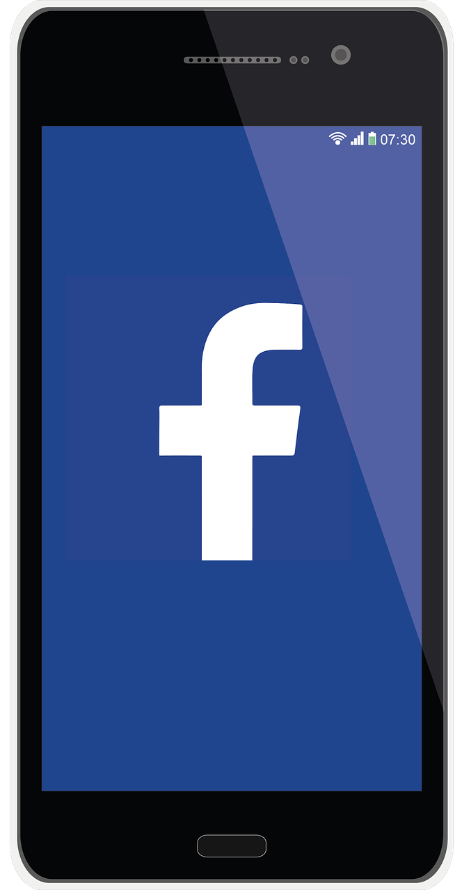 a closeup view of a cell phone showing the letter for for facebook